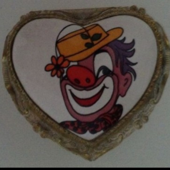 Vintage clown Goldtone heart shaped music box